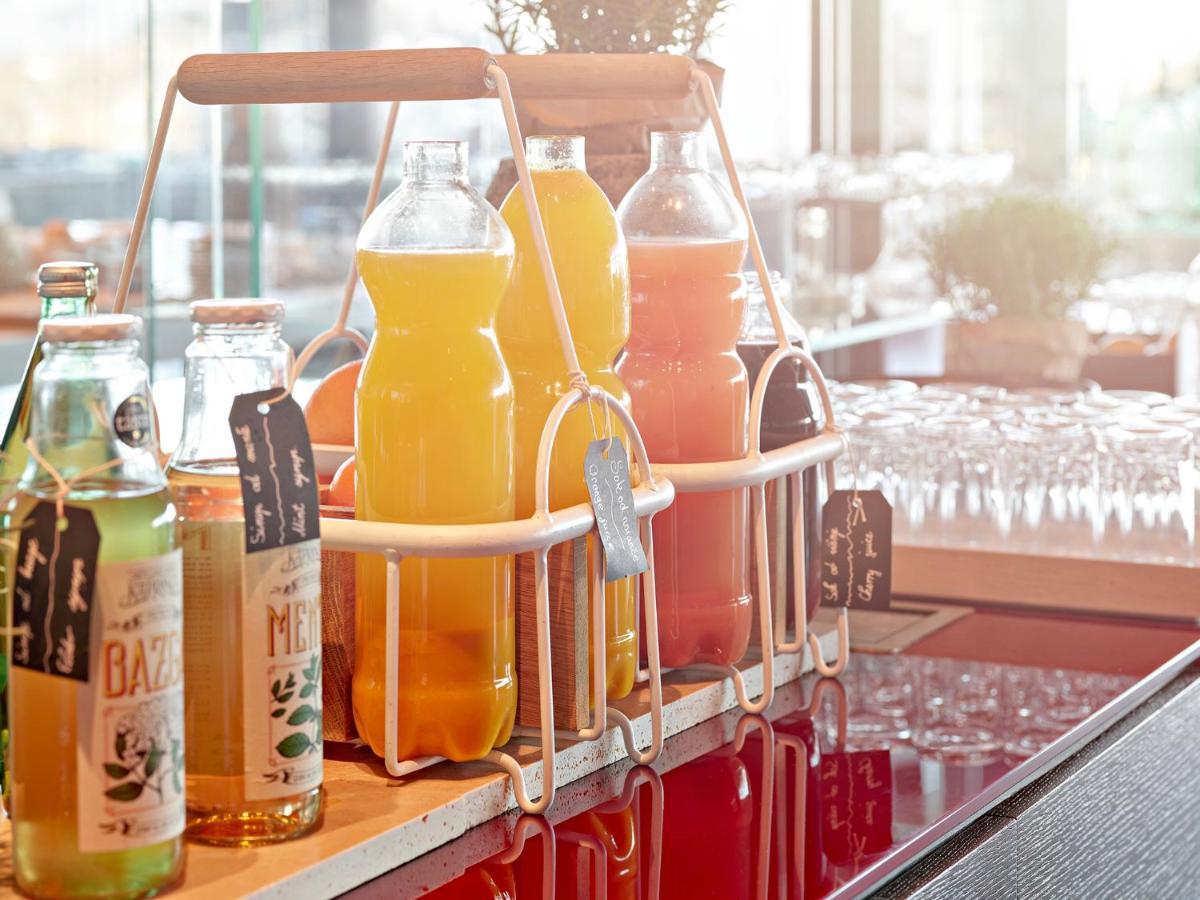 Grand Park Hotel Rovinj By Maistra Collection Esterno foto Bottles of orange juice